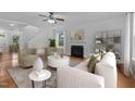 Cozy living room with a fireplace, comfortable seating, and stylish accents at 2112 Queensway Ct, Creedmoor, NC 27522