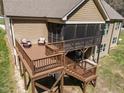 A multi-level back deck and screened porch, perfect for outdoor living and entertaining at 3220 Brassfield Rd, Creedmoor, NC 27522