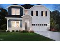 Charming new construction home with gray brick and a two-car garage at 3849 Rosebush Dr, Zebulon, NC 27597
