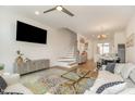 Bright, open-concept living room featuring stylish decor, hardwood floors, and contemporary furnishings at 607 N Queen St, Durham, NC 27701