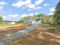 A spacious lot with a newly constructed home and an extended driveway offering ample parking space at 9550 Stallings Road Rd, Spring Hope, NC 27882