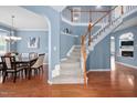 View of the foyer with a staircase and entry to the dining room at 2001 Lilly Brook St, Fuquay Varina, NC 27526
