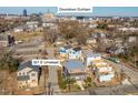 Aerial view showcasing the property's location near downtown Durham, highlighting its proximity to urban amenities at 301 E Umstead St, Durham, NC 27707