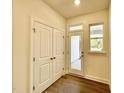 Mudroom featuring a closet and a glass panel door to the backyard at 480 Traditions Grande Blvd # 31, Wake Forest, NC 27587