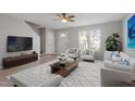 Bright living room features modern decor and hardwood floors at 1620 Briarmont Ct, Raleigh, NC 27610