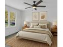 Inviting bedroom with a plush bed, neutral decor, and ample natural light from the large window at 3533 N Way Dr, Zebulon, NC 27597