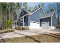 Stunning home with a three-car garage and beautifully landscaped yard at 370 Chapel Ridge Dr, Pittsboro, NC 27312
