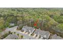 Aerial view of the home in a community with trees and landscaping at 111 Wards Ridge Dr, Cary, NC 27513