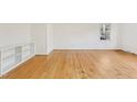 Bright, spacious living room features hardwood floors and ample natural light at 209 High House Rd, Cary, NC 27513