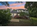 Backyard featuring a deck and a patio at 5144 Pinehall Wynd, Raleigh, NC 27604