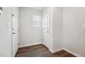 Bright entryway featuring beautiful flooring and multiple closets for storage at 918 E Green St # A102, Franklinton, NC 27525