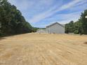 Spacious new construction home with ample space for gardening or outdoor activities at 21 Mildred Pl, Broadway, NC 27505