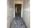 Bright hallway leading to other rooms with neutral walls and floors, ready for personalization at 21 Mildred Pl, Broadway, NC 27505