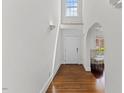 Bright foyer with hardwood floors and lots of natural light, offering a grand entrance to the home at 219 Arbordale Ct, Cary, NC 27518