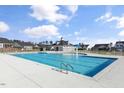 Large community pool with clear blue water, perfect for relaxing and enjoying sunny days at 279 Providence Creek Dr, Fuquay Varina, NC 27526