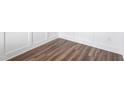 Luxury vinyl plank flooring with white trim at 304 Catheys Creek Cir, Wendell, NC 27591