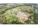 A stunning aerial view of the property and surrounding landscape at 3880 L Lawrence Trl, Graham, NC 27253