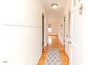 Bright entryway with hardwood floors, leading to the living spaces at 808 N Franklin Dr, Sanford, NC 27330