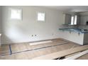 Bright kitchen with sleek gray cabinets and ample counter space ready for finishing touches at 905 Linwood Ave, Durham, NC 27701