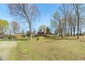 Spacious backyard and home exterior, perfect for outdoor activities and tranquil living at 2746 Moss Creek Loop, Elon, NC 27244