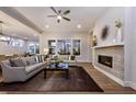 Spacious living room with fireplace, neutral colors, large windows, and modern decor at 285 Gilliland Rd, Siler City, NC 27344
