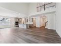 Open-concept living space with hardwood floors, modern finishes, and abundant natural light at 111 Artic Circle, Garner, NC 27529