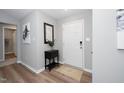 Bright foyer with luxury vinyl plank flooring and stylish decor at 121 Viajar Way, Smithfield, NC 27577