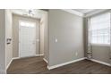 Inviting foyer with wood-look floors and a bright, welcoming ambiance at 192 Solheim Ln, Raleigh, NC 27603