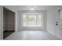 Dining area featuring a bay window offering natural light and scenic outdoor views at 2400 Hemlock Cir, Clayton, NC 27520