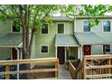 Attractive townhomes with inviting front entrances and landscaped surroundings at 308 Cedarwood Ln, Carrboro, NC 27510