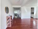 Open living room with hardwood floors and neutral walls at 3908 Bostwyck Dr, Fuquay Varina, NC 27526