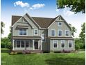 Charming two-story home featuring a covered front porch and beautiful landscaping, set against a bright sky at 70 Valebrook Ct, Youngsville, NC 27596
