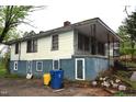 Rear exterior view of home with a visible crawl space at 537 Homeland Ave, Durham, NC 27707