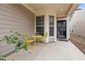 Inviting front porch with cozy seating area and beautiful details at 151 Rosedale Creek Dr, Durham, NC 27703