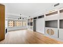 Bright living room with hardwood floors, large window and fireplace at 510 Glenwood Ave # 602, Raleigh, NC 27603
