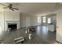 Spacious living room featuring a fireplace with gray flooring, awaiting your personal touches at 102 Ruskin Dr, Smithfield, NC 27577