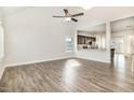Spacious living room with lots of natural light, vaulted ceiling, and open floor plan at 15 Woodworkers Way, Clayton, NC 27520