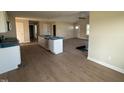 Bright, open concept kitchen with an island and modern appliances at 47 Silver Ct, Smithfield, NC 27577