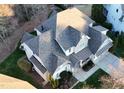 Overhead view showing architectural detailing of roof, landscaping, and neighborhood at 113 Woodland Ridge Ct, Cary, NC 27519
