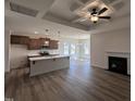 Stylish kitchen boasts a breakfast bar, modern stainless steel appliances, and an open layout perfect for entertaining guests at 141 Trescott St, Smithfield, NC 27577