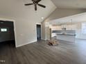 Spacious living room boasts modern gray flooring and an open layout perfect for entertaining at 221 Tee Dr, Selma, NC 27576