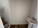 New half bathroom featuring a pedestal sink and toilet, ready for finishing touches at 33 W Emily Gardens Dr, Selma, NC 27576