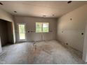 Kitchen in progress with a door to the exterior and a window at 40 Bailey-Boykin Rd, Selma, NC 27576