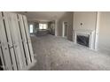 Spacious living area with fireplace and ample natural light, perfect for entertaining at 40 Bailey-Boykin Rd, Selma, NC 27576