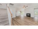 Spacious living room with fireplace and luxury vinyl plank flooring at 40 Tuskeegee Dr, Smithfield, NC 27577