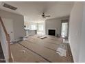Spacious living room with fireplace open to the modern kitchen, perfect for entertaining and Gathering gatherings at 40 Tuskeegee Dr, Smithfield, NC 27577