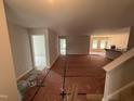 Bright living room featuring an open floor plan and ample natural light at 41 W Emily Gardens Dr, Selma, NC 27576