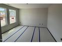 Bright bedroom with large windows that allow ample natural light to illuminate the room at 43 Chloe Ct, Selma, NC 27577