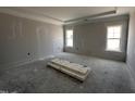 Bedroom with two windows and doors ready to be installed at 56 Bailey-Boykin Rd, Selma, NC 27576