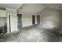 Spacious interior with a neutral palette, showcasing multiple doorways and potential for a flexible layout at 56 Bailey-Boykin Rd, Selma, NC 27576